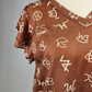 MK668 Branded Ruffled Sleeve Blouse